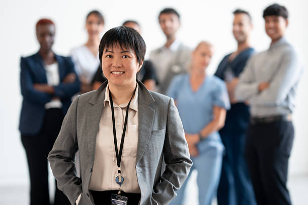 istock Confident Professional Woman Leading a Diverse Team in a Corporate Environment 2224662590