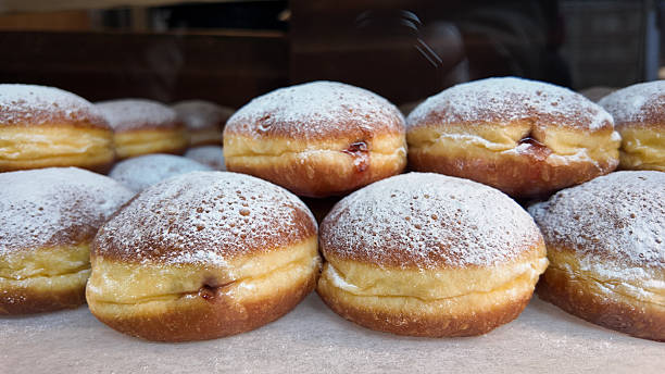 istock Delicious filled pastries displayed in a bakery window 2224666194