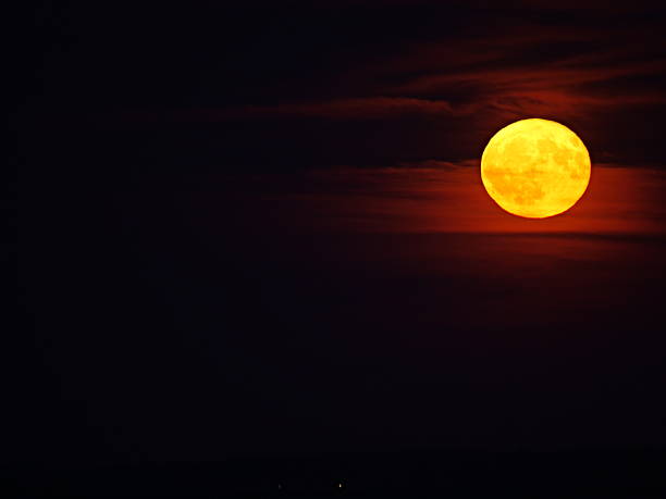 istock Moonrise - Strawberry Moon veiled in June 2025 2224670073