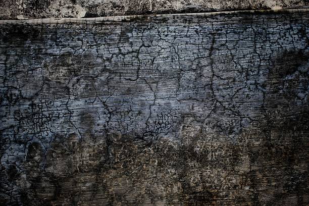 istock Detailed Close-Up of Weathered Cracked Surface with Unique Textures 2224672883