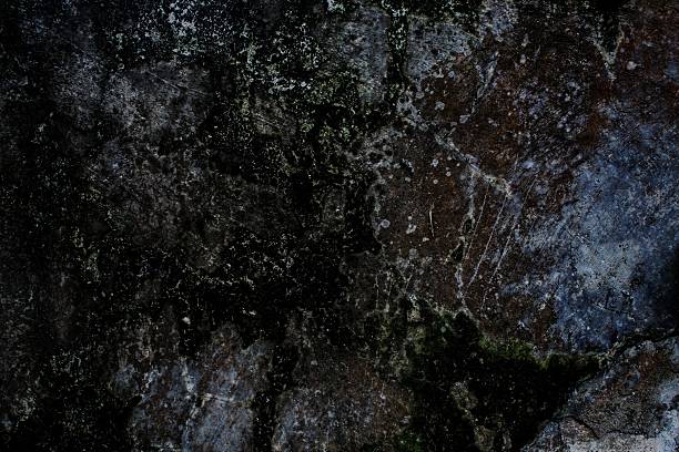 istock Detailed Close-Up of Weathered Cracked Surface with Unique Textures 2224674114