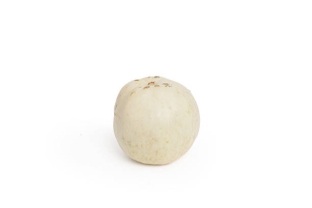 istock A fresh honeydew melon with a smooth, pale green rind isolated on white background. Known for its sweet, juicy flesh, it's ideal for use in fruit salads, beverages, and desserts. 2224674709
