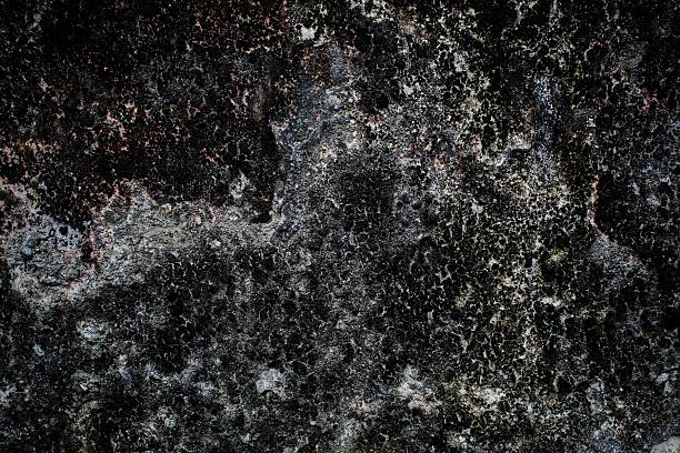 istock Close-Up Texture of Weathered Painted Wall with Exposed Concrete 2224674788