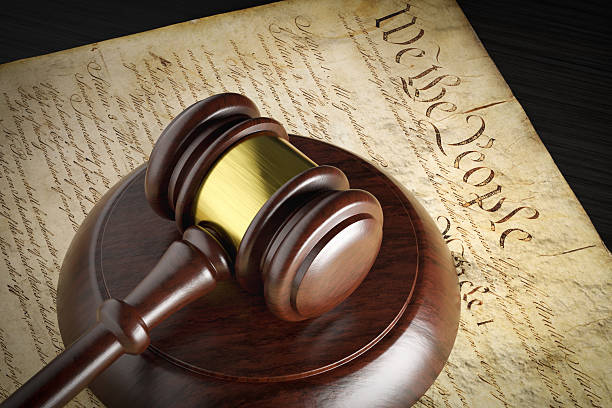 istock United States Constitution and Gavel Resting on Table. 2224677032