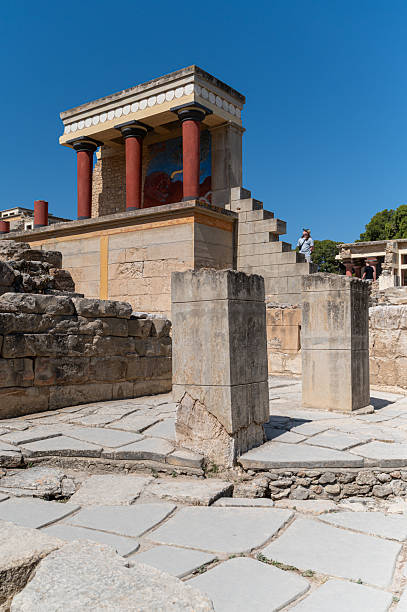 Knossos, Crete, Greece - June 25, 2025: Visitors explore the archaeological site of Knossos, revealing ancient Minoan civilization.