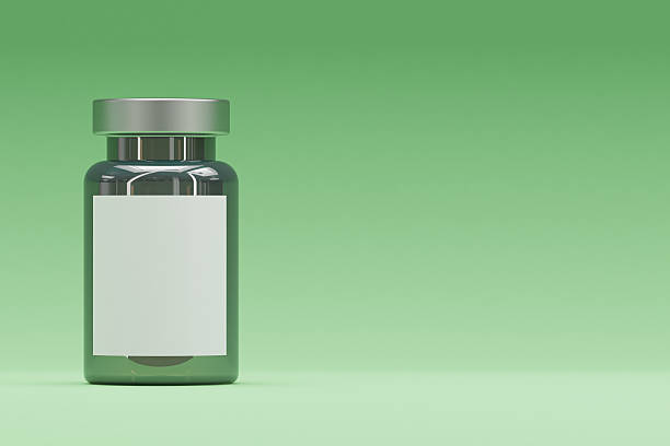 High-resolution 3D render of a small vaccine vial featuring a clean white label, perfect for replacing with custom branding or design. Set against a smooth green gradient background, this mockup is ideal for designers, pharmaceutical presentations, medical product packaging, and promotional materials. The minimal setup emphasizes the label area, offering a professional and versatile template for showcasing logos, product names, or regulatory information in a realistic context.