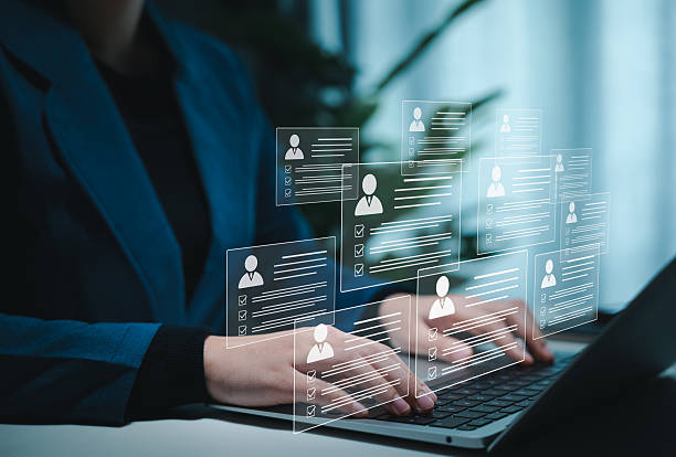 istock Digital Resume Screening by HR Professional. Human resource manager evaluate multiple resumes or CV online, modern recruitment and candidate selection processes. best employees for corporate business. 2224679283