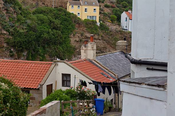 istock A hillside village scene with rooftops, a hint of laundry 2224680273