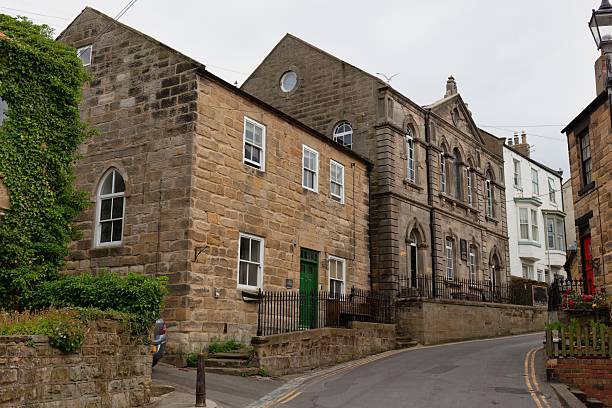 istock A quaint streetscape showcases an array of historic stone buildings 2224680326