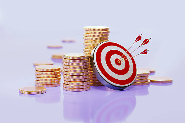 istock Coin Stacks And Red Target On Purple Background - Business Target Concept 2224680966