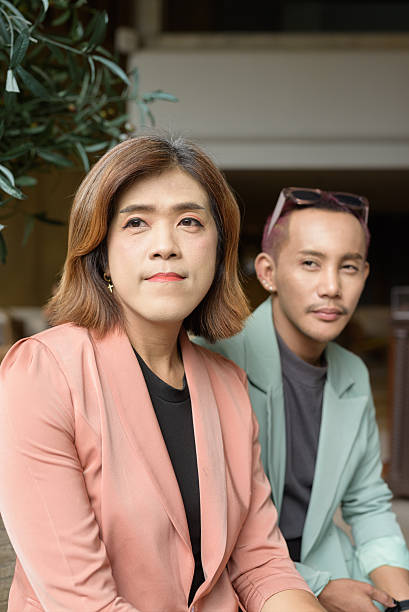 istock Transgender and non-binary coworkers working remotely in cafe 2224681112