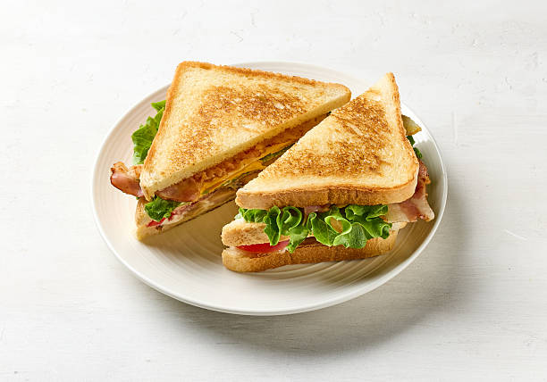 istock club sandwich on white plate 2224681148