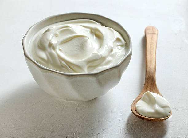 istock bowl of sour cream jogurt 2224681170