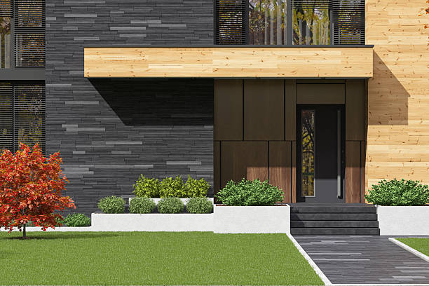 istock Modern Two-Story House with Slate Stone and Wood Facade in Autumn Setting 2224681321