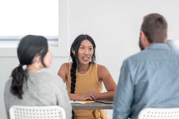istock Group Discussion Among Colleagues in a Bright and Modern Office Setting 2224681992
