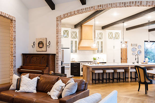Open concept home showcasing a stylish kitchen and comfortable living area.