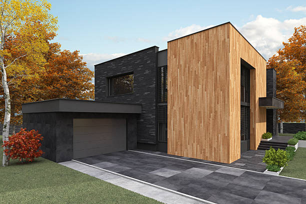 istock Cube-Shaped Modern House with Stone and Wood Facade in Autumn Setting 2224685868
