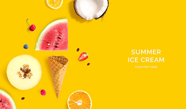 istock Ice cream cone with raspberry, blueberry, coconut, lemon, melon and watermelon. Flat lay. Food concept. Yellow background. 2224687600