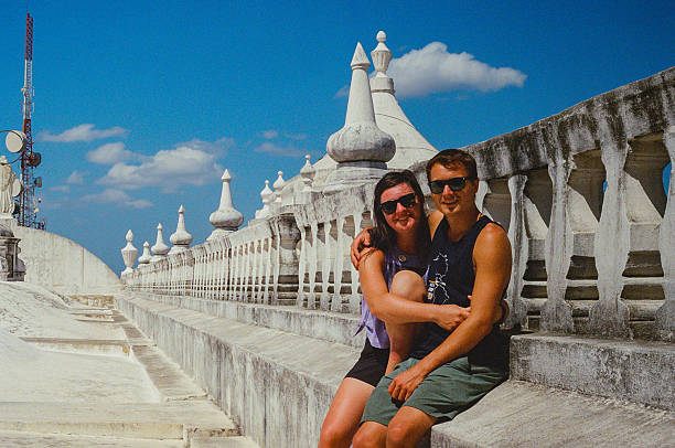 istock Happy Couple Visiting Scenic Landmark on a Bright Sunny Day 2224689857
