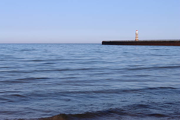 Lighthouse at the end of a pier