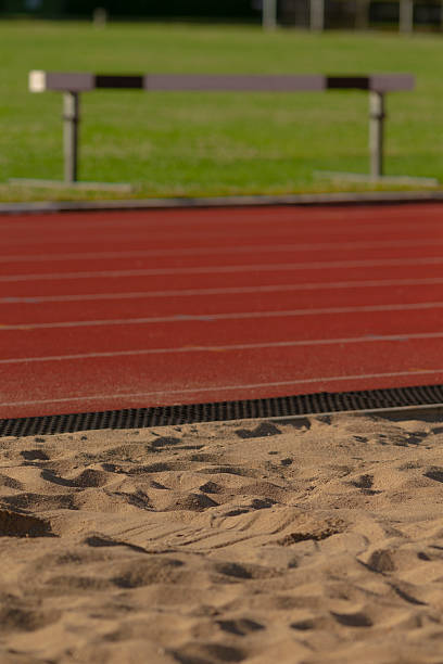 istock A sandy track features a hurdle in the distance as a backdrop 2224692090