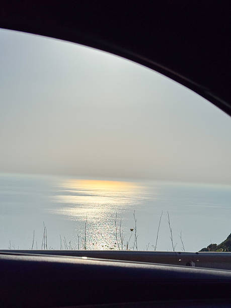istock Coastal Sunrise View from Car Window Overlooking Sea 2224694399