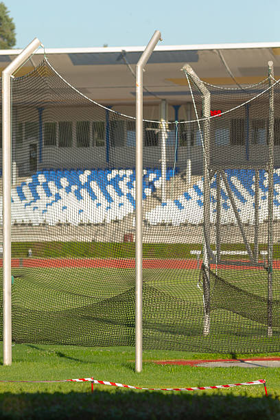 istock A spacious stadium featuring blue and white seats with a net in front, 2224696245