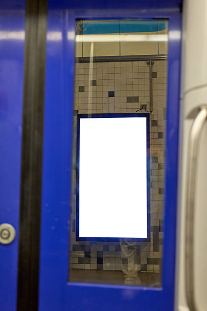 istock Blank advertising billboard inside subway train seen through doors 2224697880