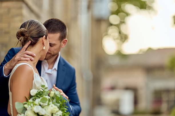 istock Bride and Groom Sharing a Romantic Moment on Their Wedding Day 2224705328