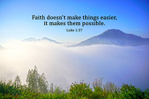 Bible verse quote from Luke 1:37 - Faith doesn't make thing easier, it makes them possible. on blue sky over mountains background with white fog and green trees. Christianity. Religious words.