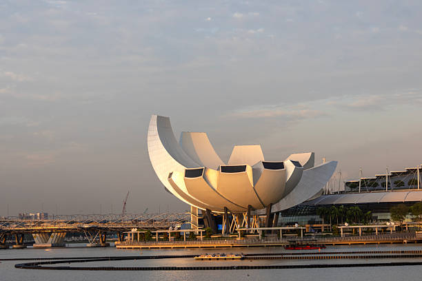 Singapore-4 Jun 2025: View of Artscience Museum in the evening, Singapore. ArtScience Museum is an iconic cultural landmark in Singapore and the cultural component of Marina Bay Sands
