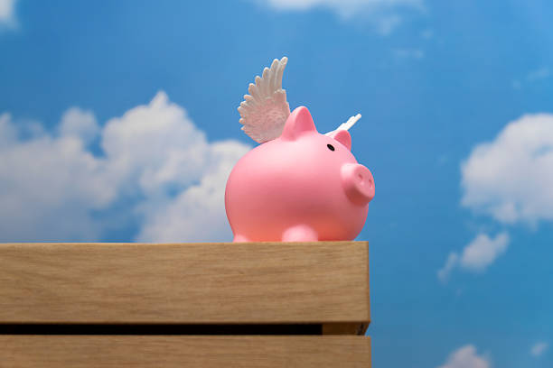 A pink pig with small white wings. Represents the idiom when pigs fly, signifying something highly improbable or impossible.