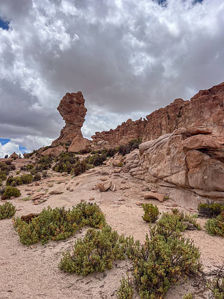 istock Rocky Desert Landscape with Cloudy Sky 2224727240