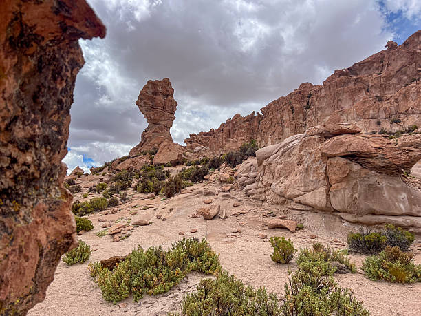 istock Rocky Desert Landscape with Cloudy Sky 2224727245