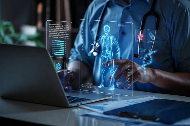 istock Doctor using a laptop with medical interface displaying a human skeleton. 2224728314