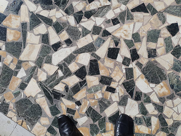 istock two feet on tiled floor top view 2224729952