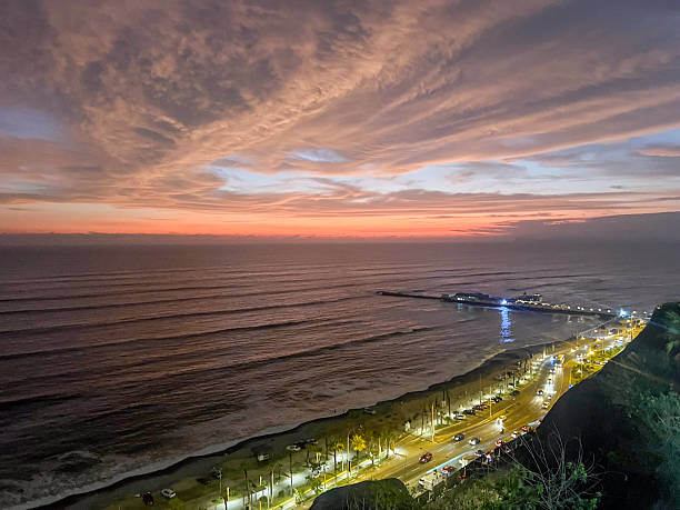 istock Coastal Sunset with Pier and Beach Road 2224730048