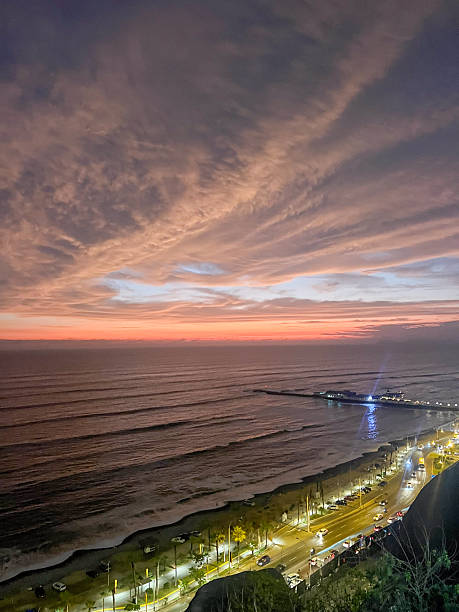 istock Coastal Sunset with Pier and Beach Road 2224730072