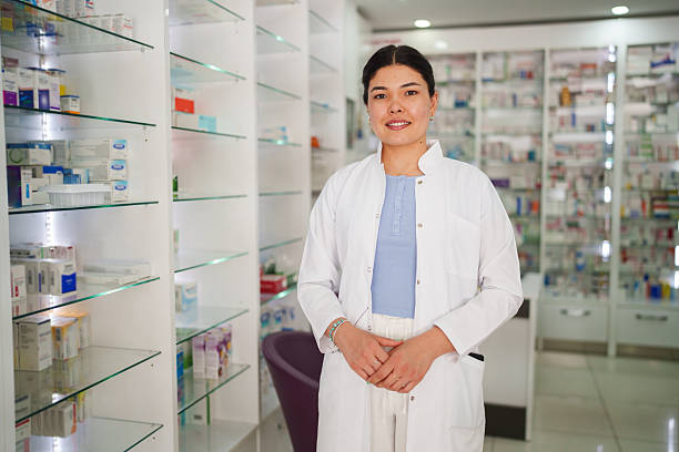 istock Smiling Female Pharmacist Looking at Camera in Her Pharmacy 2224737538