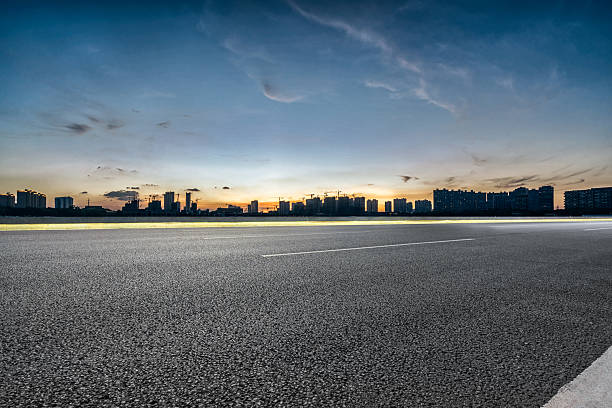 istock Empty asphalt road and blue sea nature landscape at sunset. 2224738517