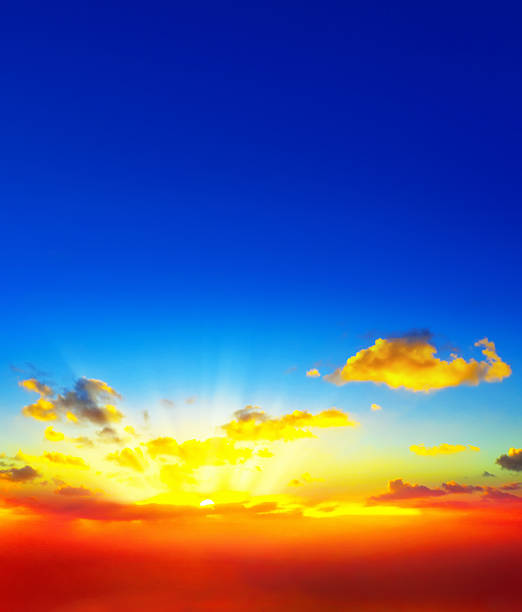 istock Full frame colorful sunset sky with sunbeam background 2224739713