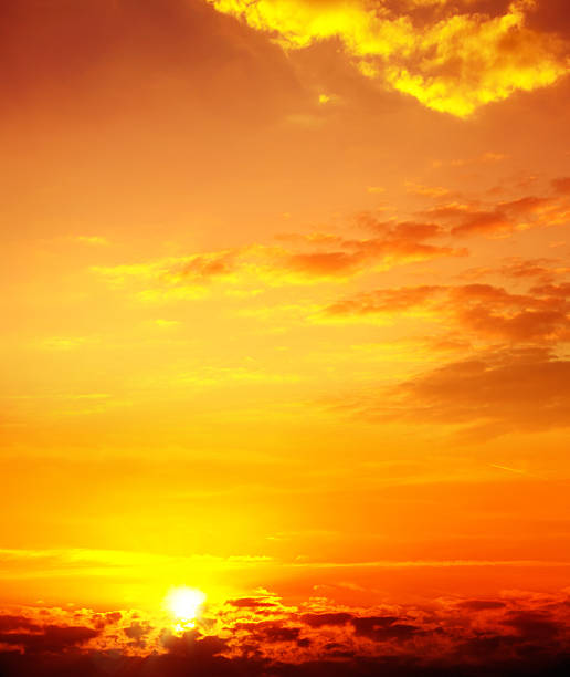 istock Full frame orange color sunset sky with sunbeam background 2224739734