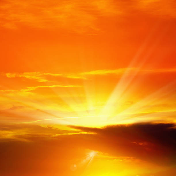 istock Full frame orange color sunset sky with sunbeam background 2224739826