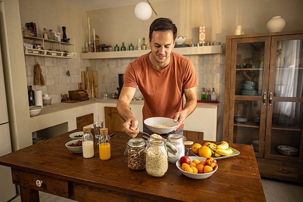 istock Man preparing healthy breakfast at home 2224743553
