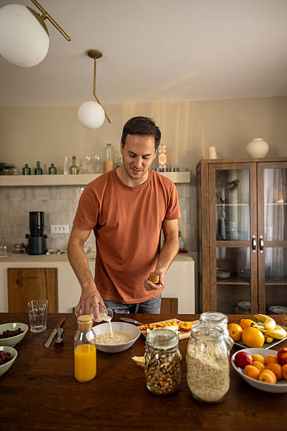 istock Man preparing healthy breakfast at home 2224744026
