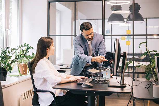 istock Business Team Collaboration in Modern Office Setting with Technology 2224746869