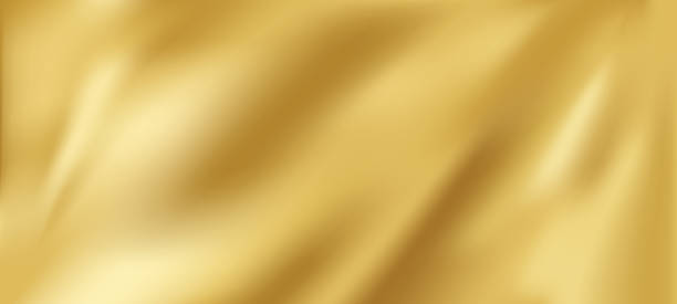 istock texture of natural gold silk. Light Golden fabric smooth texture surface background. Smooth elegant gold silk in Sepia toned. Texture, background, pattern, template 2224747860