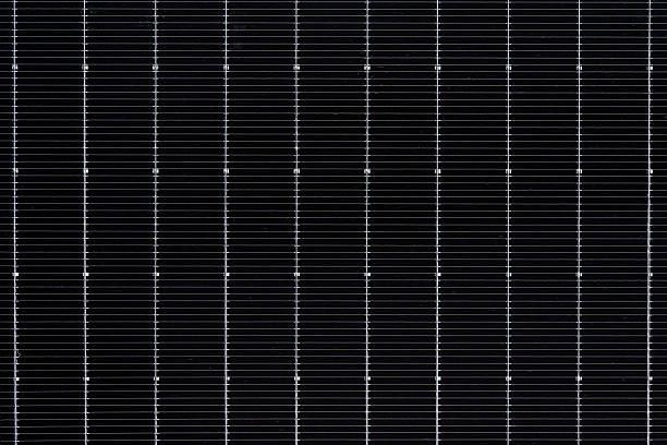 istock Solar panels close up with visible grid lines and panel seams. 2224751192