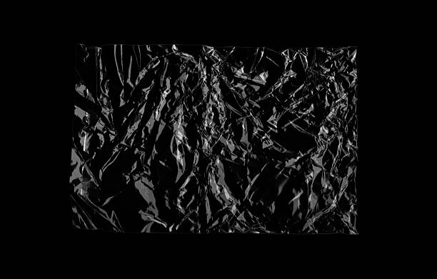 istock Plastic film texture on a transparent background with heavy crumpling. High-contrast grunge element for layering, poster design, or edgy digital collage. 2224768661