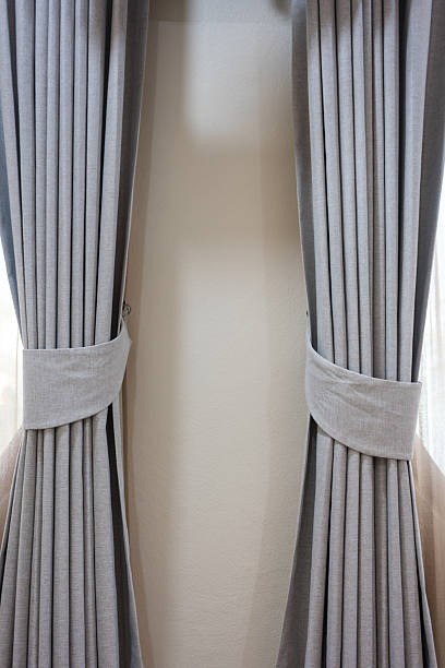 istock Elegant gray curtain showcasing modern interior design. Perfect decor element for home. 2224768823